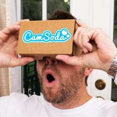 bearded man shocked wearing cardboard vr headset camsoda vr